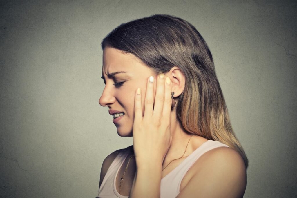 why does my earring hole hurt
